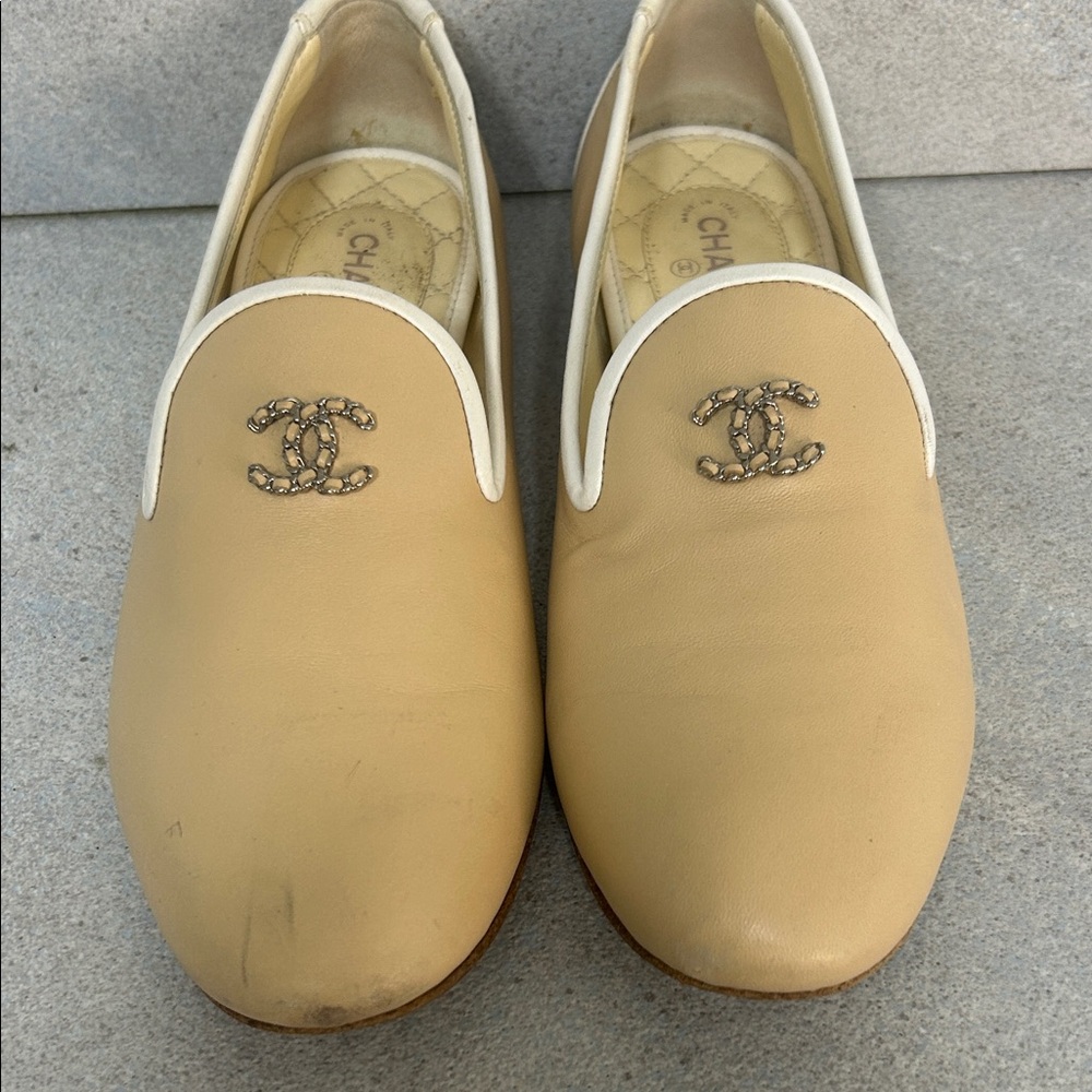 CHANEL Cream Loafers with Iconic Emblem